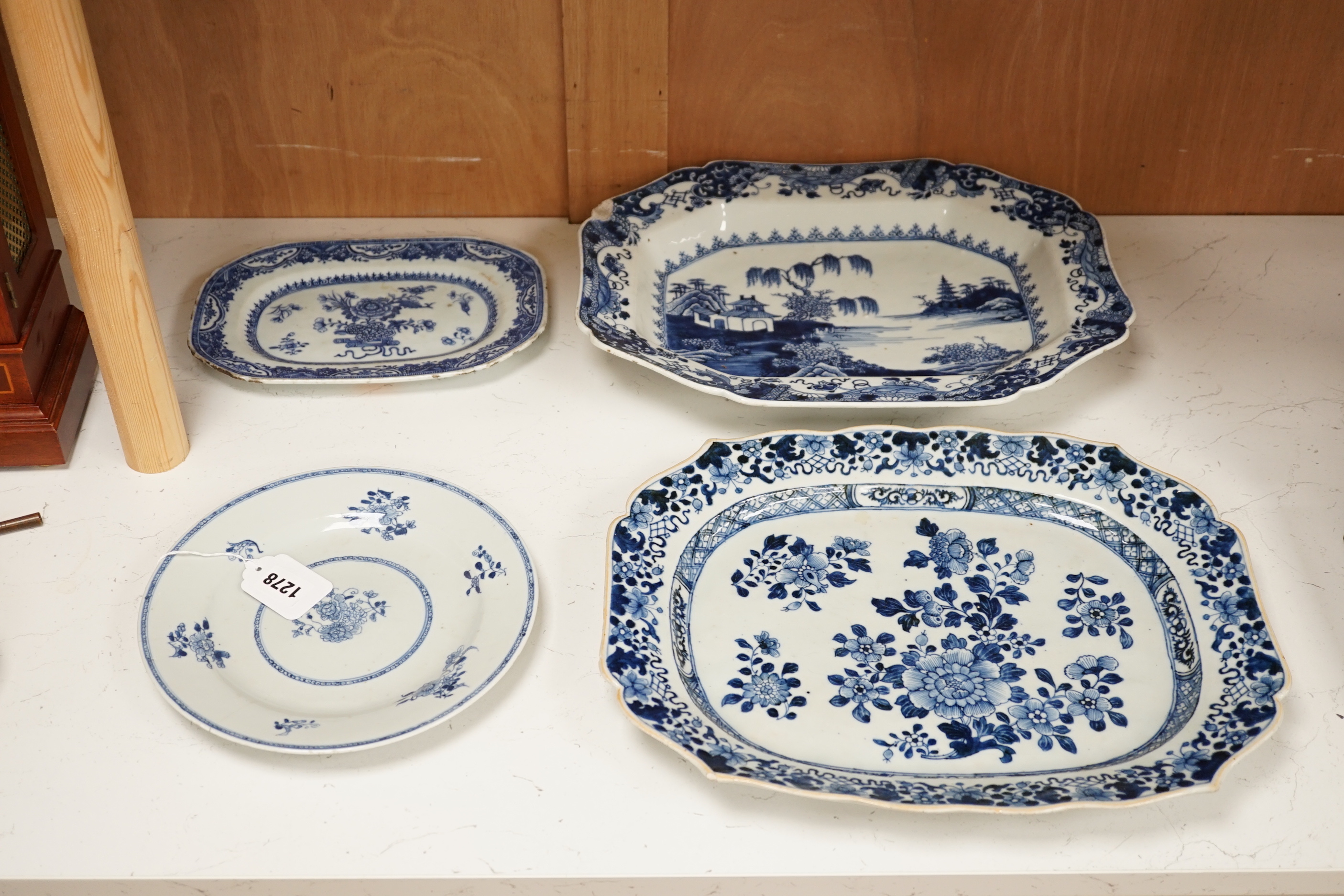 Three 18th century Chinese blue and white serving dishes and a similar plate, largest 38cm